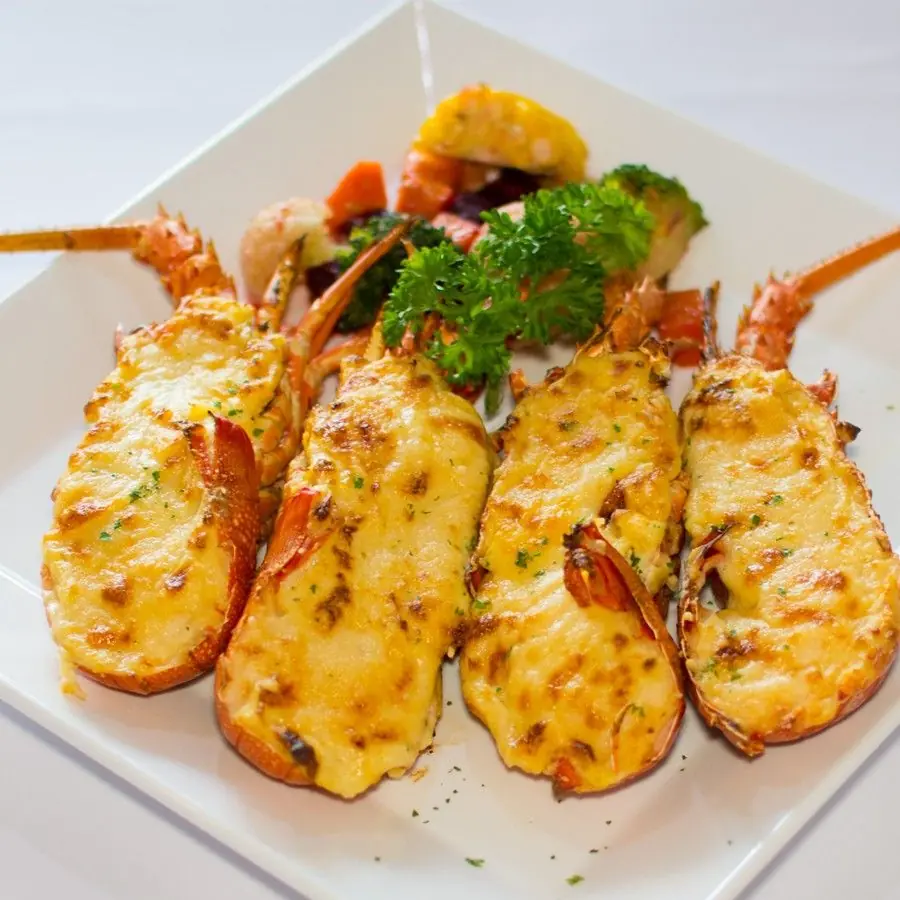 Cheesy Garlic Butter Baked Lobster Tails