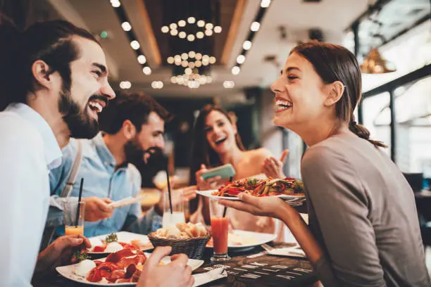 Why Eating With Others Can Change How Much — and How You Eat