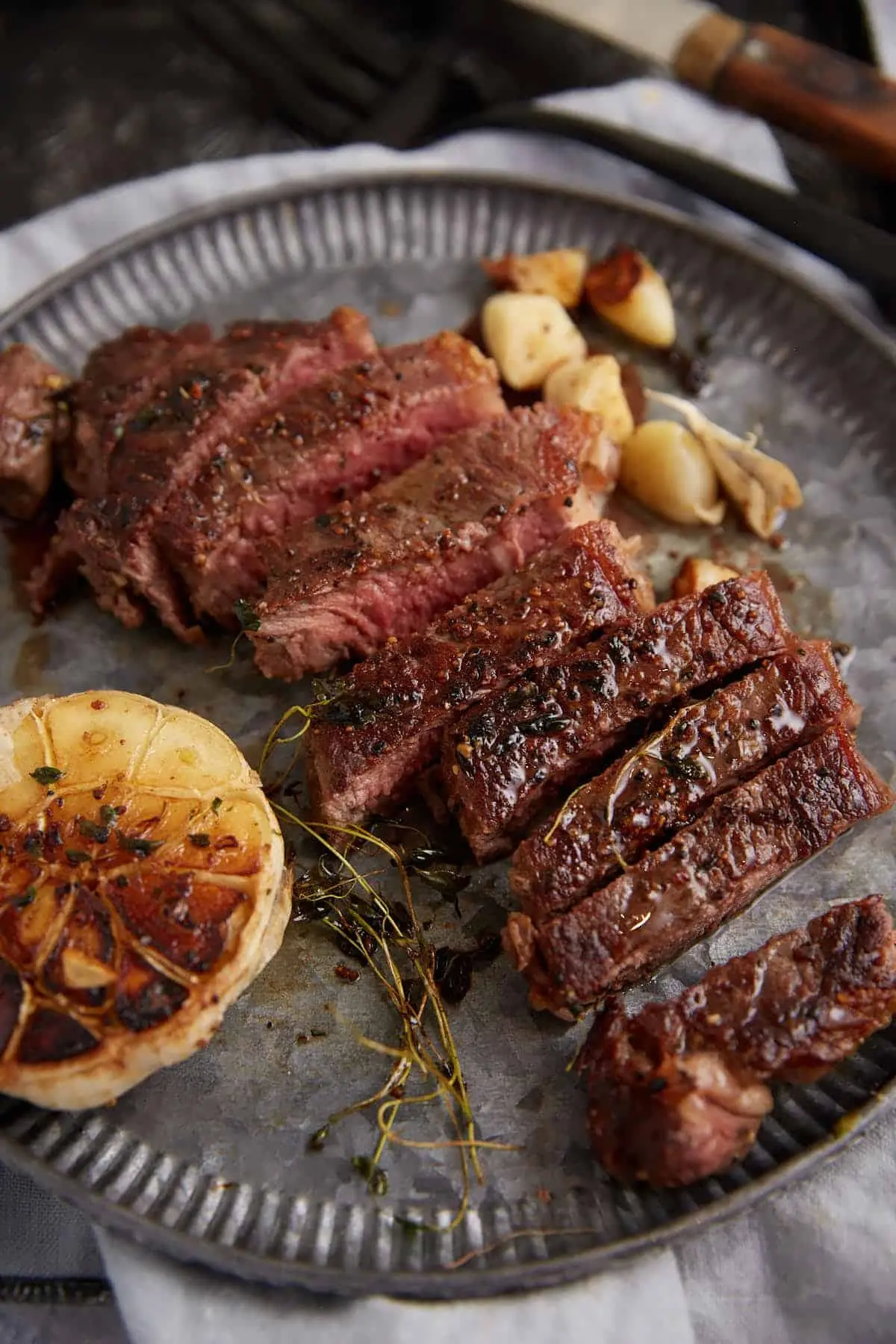 Garlic Butter Ribeye Steak – A Juicy Medium-Rare Steak with Rich, Glossy Sauce