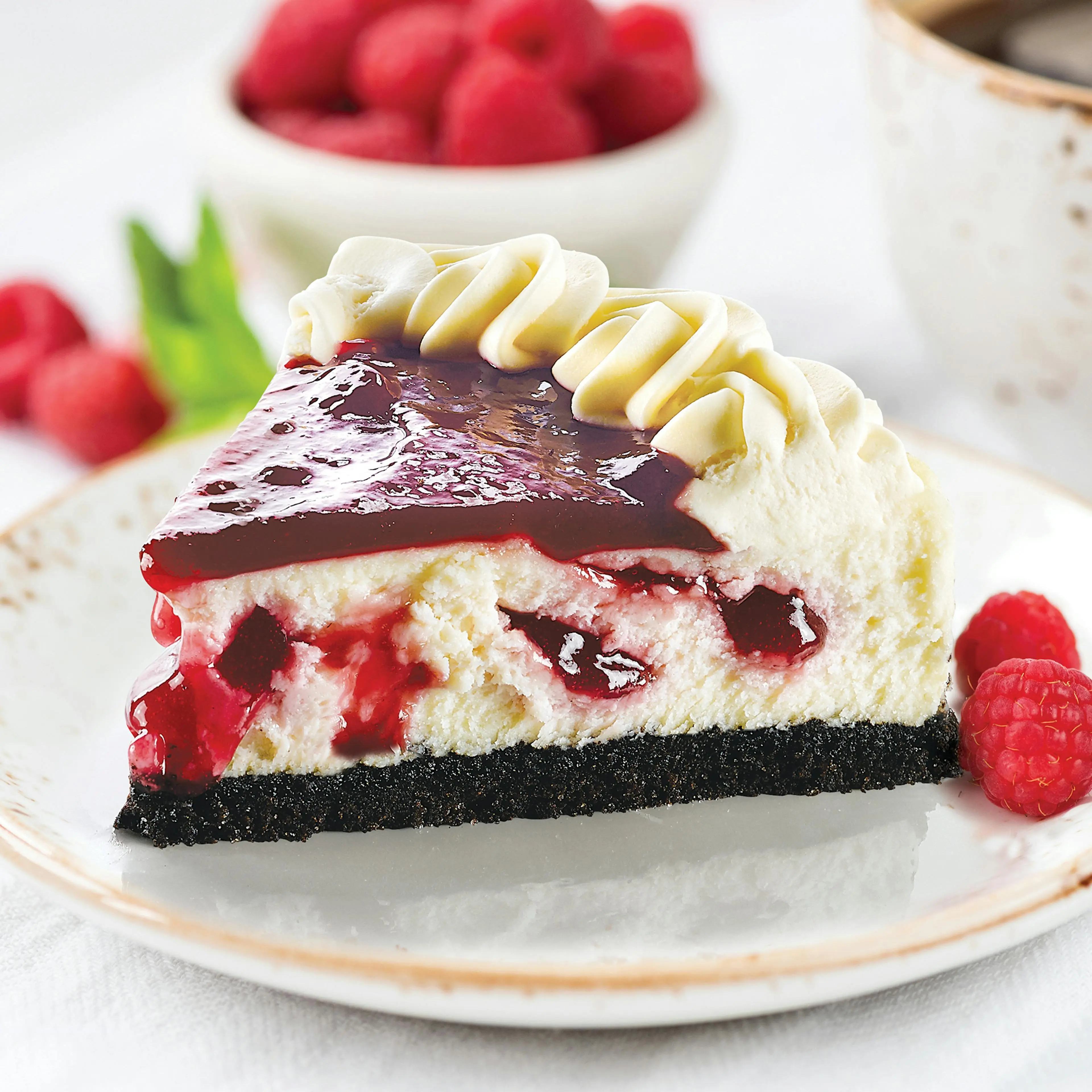 Raspberry White Chocolate Cheesecake – A Silky Cheesecake with Bright Raspberry Swirls