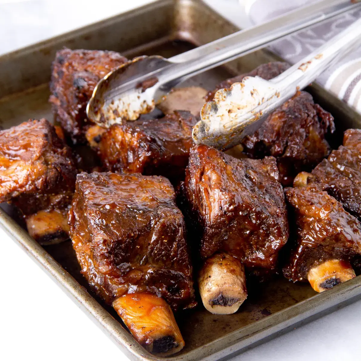 Midnight BBQ Short Ribs – Dark Glazed Beef with a Velvety Bone Marrow Flow