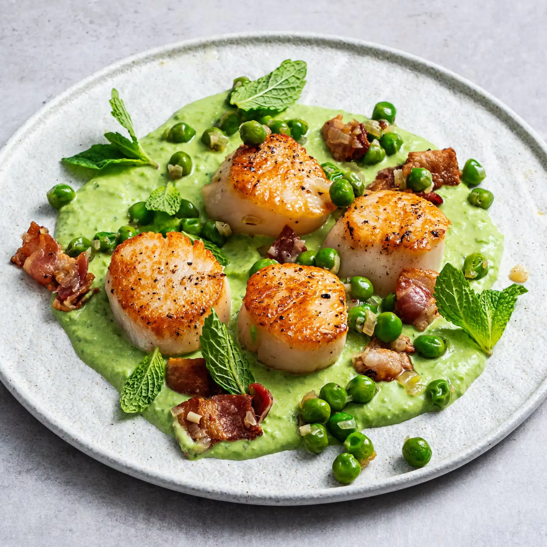 Pan-Seared Scallops – Jumbo Scallops with Silk Pea Purée and Minted Herb Oil