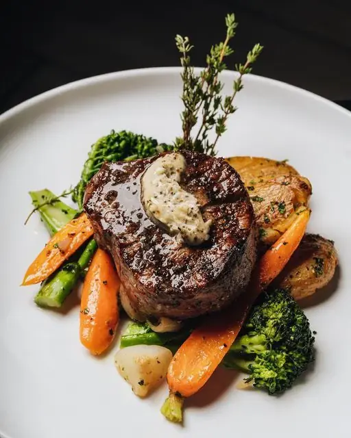 🥩 Filet Mignon with Herb Butter and Roasted Vegetables – Elegant Dining at Its Finest