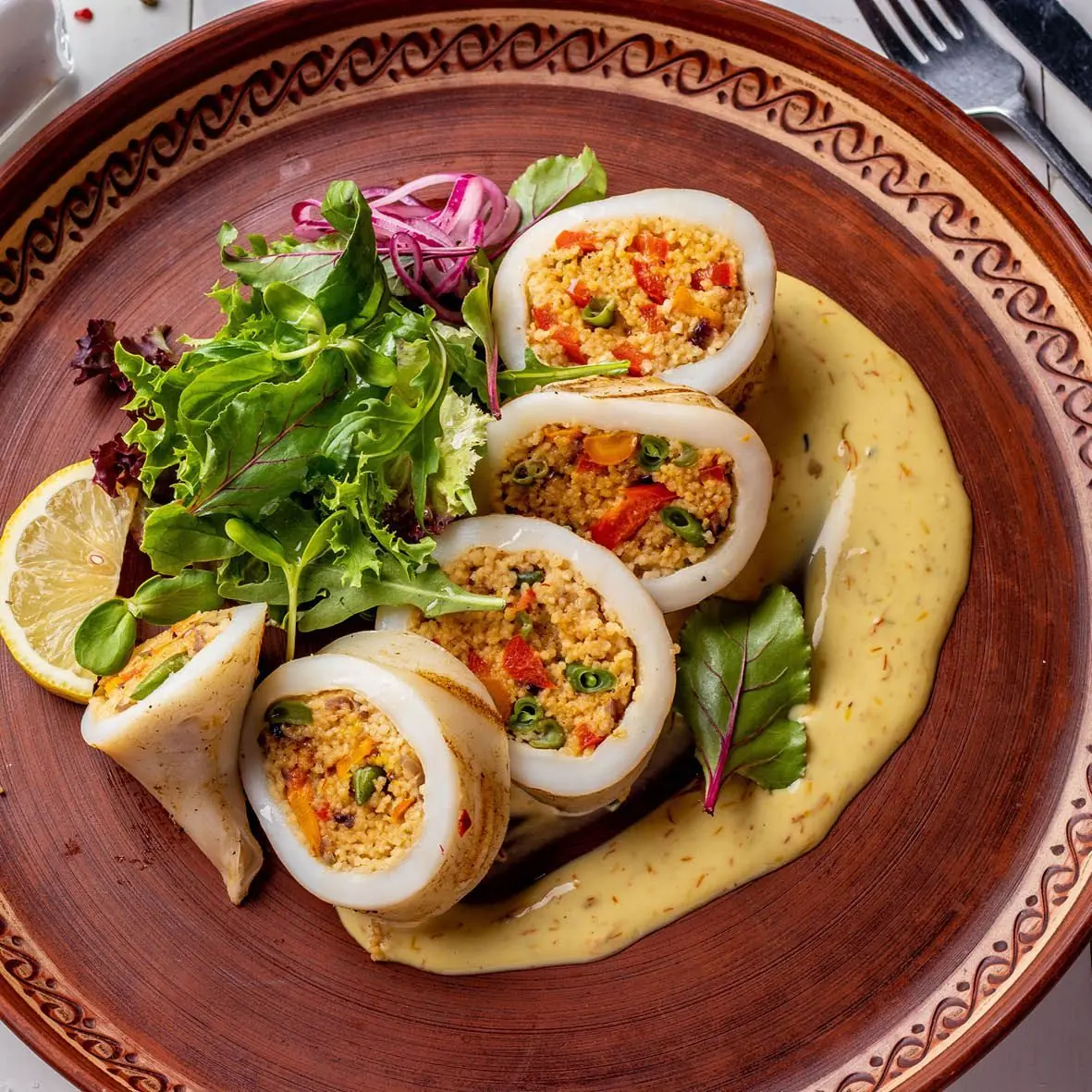 Mediterranean Stuffed Calamari with Saffron Cream Sauce