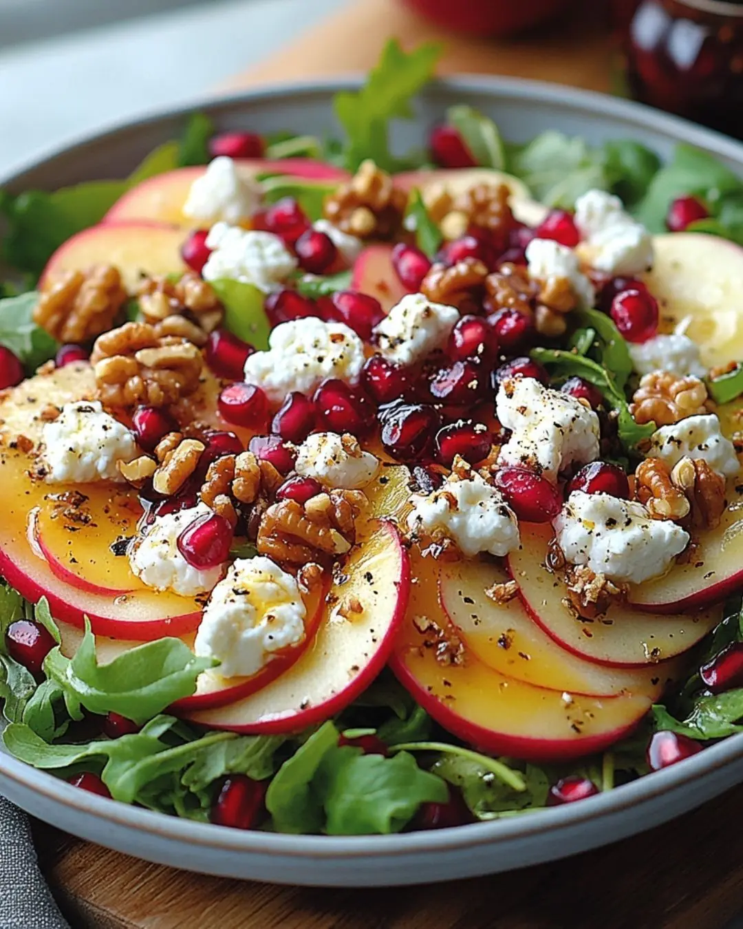 Apple, Goat Cheese & Pomegranate Salad with Maple Balsamic Vinaigrette